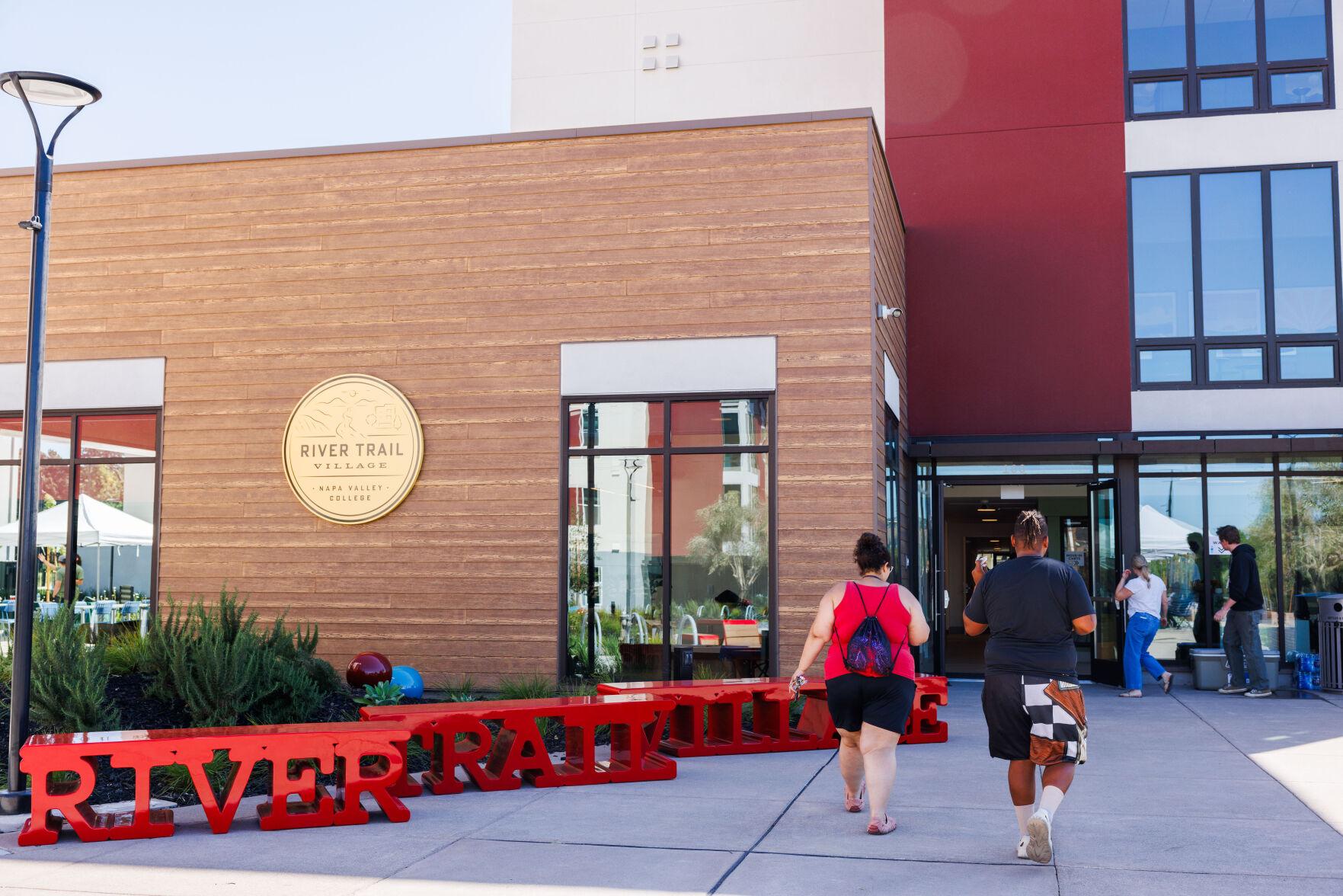 students walking into building